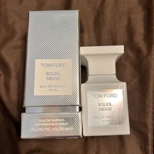 Tom Ford Soleil Neige 1oz. Opened and sprayed one time. Not for me.